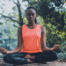 Woman meditating in the outdoors