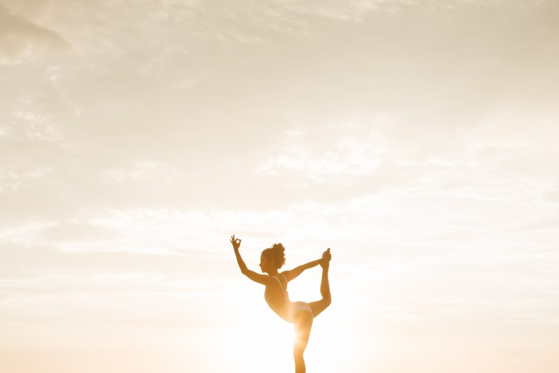 Lady doing yoga pose mind-body wellness