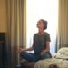 Woman meditating on bed